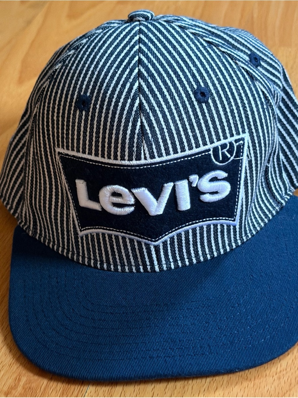 Levi’s Youth Navy and White striped Ball Cap.